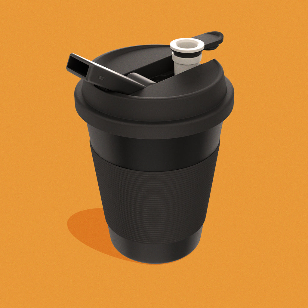 Flat black essential "To Go" Cup on orange background (showing top pieces opening)